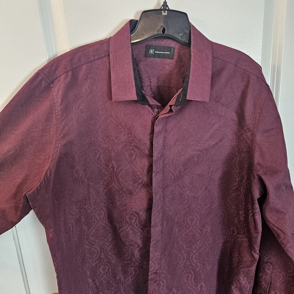 Large deep red long sleeve button-up. With an outstanding design